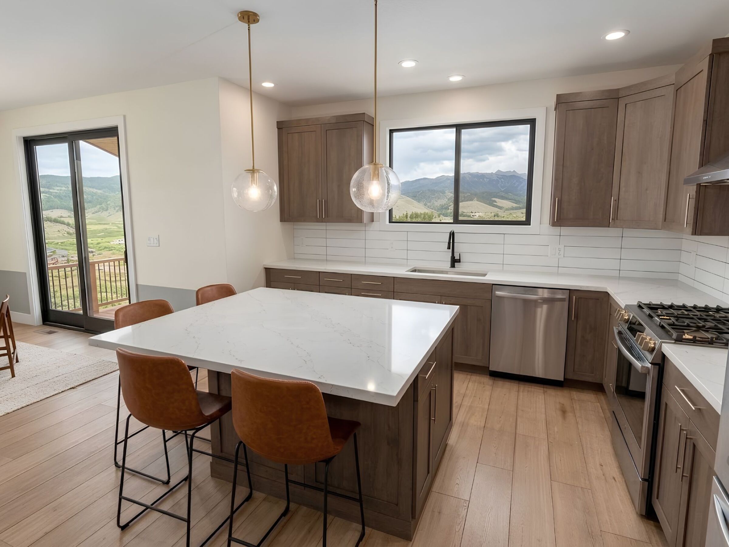 Rendering of the kitchen at 101 Lupine Lane with the island and mountain view